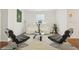 Inviting living room with hardwood floors, modern furniture, and a neutral color scheme for comfortable living space at 5248 Royal Point Ave, Kissimmee, FL 34746