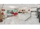 Modern open floor plan combining kitchen, dining, and living area, great for entertaining at 5248 Royal Point Ave, Kissimmee, FL 34746