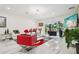 Modern living room featuring white marble floors, contemporary furnishings, and stylish decor at 5248 Royal Point Ave, Kissimmee, FL 34746