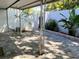 Backyard features decorative brick floors, lush foliage and access to a tranquil outdoor space at 567 E Orange St # 567, Altamonte Springs, FL 32701