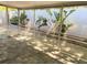 Screened patio provides a tranquil outdoor space with stone floors and tropical plants at 567 E Orange St # 567, Altamonte Springs, FL 32701
