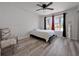 Comfortable bedroom with lots of natural light, a ceiling fan, and neutral decor at 6142 Westgate Dr # 204, Orlando, FL 32835