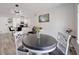 Open-concept dining area flowing into a modern kitchen with bar seating at 6142 Westgate Dr # 204, Orlando, FL 32835