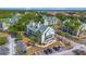 This exterior view shows the building in a landscaped setting with parking at 6142 Westgate Dr # 204, Orlando, FL 32835