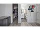 Spacious hallway with dual access to a bathroom and closet at 6142 Westgate Dr # 204, Orlando, FL 32835