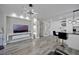 Modern living room featuring sleek finishes, recessed lighting, and a stylish open floorplan at 6142 Westgate Dr # 204, Orlando, FL 32835