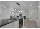 Modern kitchen with bar seating and adjoining dining area create an ideal living space at 6142 Westgate Dr # 204, Orlando, FL 32835