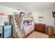 bedroom featuring playful decor, bunk beds, and a retro mini refrigerator at 645 Manor Rd, Maitland, FL 32751