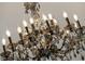 Detailed shot of chandelier showing many crystals and bulbs at 645 Manor Rd, Maitland, FL 32751