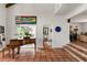 Lovely entryway with brick floors, a piano, and a view into the stylish living spaces at 645 Manor Rd, Maitland, FL 32751