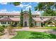 Grand home featuring lush landscaping, brick pathway, and an arched entrance at 645 Manor Rd, Maitland, FL 32751