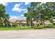 Beautiful home with a well-kept lawn, lush landscaping, and a welcoming entrance at 645 Manor Rd, Maitland, FL 32751