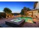 Beautiful backyard pool and spa with brick pavers and an outdoor kitchen and covered patio at 645 Manor Rd, Maitland, FL 32751