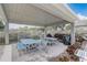 Covered community picnic area featuring multiple tables and benches for outdoor dining at 682 Lexington Dr, Clermont, FL 34711