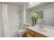 Bathroom features a shower/tub combo, neutral finishes, and a single sink vanity at 7420 Cypress Grove Rd # 132, Orlando, FL 32819