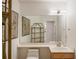 Bathroom features a large mirror, light fixture, single sink, and toilet at 7420 Cypress Grove Rd # 132, Orlando, FL 32819