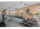 Well-equipped gym featuring various exercise machines for a complete workout experience at 7420 Cypress Grove Rd # 132, Orlando, FL 32819
