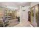 Open living area with built-in shelving, transitional flooring and ample space for seating at 7420 Cypress Grove Rd # 132, Orlando, FL 32819