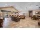 Inviting lounge area featuring tile flooring and comfortable seating, perfect for relaxation and socializing at 7420 Cypress Grove Rd # 132, Orlando, FL 32819