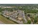 Expansive aerial view of apartments with parking, greenery, and convenient access to nearby amenities at 8213 Claire Ann Dr # 108, Orlando, FL 32825