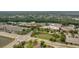 Aerial scene of community buildings and campus surrounded by abundant greenery at 8213 Claire Ann Dr # 108, Orlando, FL 32825