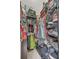 Organized closet with clothing racks, shelving, and storage solutions for shoes, luggage, and accessories at 8213 Claire Ann Dr # 108, Orlando, FL 32825
