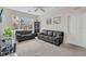 Cozy living room featuring two couches and neutral carpet at 8213 Claire Ann Dr # 108, Orlando, FL 32825