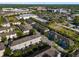 High angle aerial view showcases the community layout, landscaping, and nearby commercial development at 861 Taramundi Dr, Oviedo, FL 32765