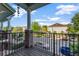 View from a cozy balcony that overlooks the parking area and neighboring properties at 861 Taramundi Dr, Oviedo, FL 32765