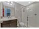 Tastefully updated bathroom with shower, toilet, and vanity at 861 Taramundi Dr, Oviedo, FL 32765
