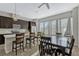 Bright, modern kitchen with stainless appliances, a center island, and comfortable seating area at 861 Taramundi Dr, Oviedo, FL 32765