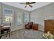 Bright office space with large windows and neutral carpeting at 861 Taramundi Dr, Oviedo, FL 32765
