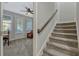 Carpeted stairway that leads to an upstairs landing and bonus room at 861 Taramundi Dr, Oviedo, FL 32765