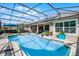 Stunning screened-in pool with spa and lots of space to relax in the sun at 9126 Shadowbrook Trl, Orlando, FL 32825