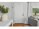 Bright entryway featuring hardwood floors and neutral wall color at 715 Braidwood Ln, Orlando, FL 32803