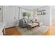 Inviting living room featuring natural light, a comfortable sectional, and stylish decor at 715 Braidwood Ln, Orlando, FL 32803