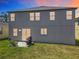The exterior of a two-story house with a well-maintained lawn at 1225 Greenley Ave, Groveland, FL 34736