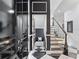Elegant home entryway with black and white tile and staircase at 1581 Forest Ave, Winter Park, FL 32789