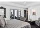 Beautiful main bedroom with great natural light and stylish furnishings at 1581 Forest Ave, Winter Park, FL 32789