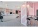 A vibrant ice cream shop with tables, stools, and pink decor offering a delightful treat experience at 2326 Calabria Ave, Davenport, FL 33897