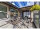 A relaxing outdoor space featuring an outdoor kitchen and a cozy sitting area at 528 Bridgeford Crossing Blvd, Davenport, FL 33837
