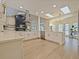 Updated kitchen showcasing breakfast bar, white cabinetry and stainless steel appliances at 554 Estates Pl, Longwood, FL 32779
