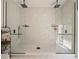 Luxurious shower with dual rainfall showerheads and large glass enclosure at 554 Estates Pl, Longwood, FL 32779