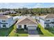 Charming single-Gathering home with manicured front yard and a two car garage at 10002 Brown Burrow St, Orlando, FL 32829
