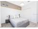 Neutral bedroom featuring a comfy bed, stylish decor, and ample closet space at 1013 Leader St, Davenport, FL 33896