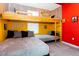 Fun bedroom featuring a bunk bed with modern wooden finishes and unique decor at 1013 Leader St, Davenport, FL 33896