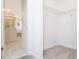 Walk-in closet featuring carpeted floors, white walls, and wire shelving for optimal storage at 1013 Leader St, Davenport, FL 33896