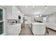 Bright kitchen with a large island and stainless steel appliances create an inviting space for cooking and entertaining at 1027 Dees Dr, Oviedo, FL 32765