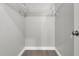 Spacious walk-in closet with metal racks for organized storage of clothes and accessories at 1027 Dees Dr, Oviedo, FL 32765