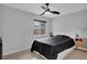 Clean bedroom with tile flooring, featuring a window to the outside at 1397 Candlewyck Dr, Orlando, FL 32807